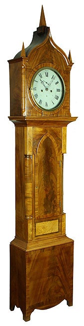 The Gothic period was relatively short-lived and the tall case clock form was quickly going out of favor, as spring clock works were becoming popular. Consequently, this is a fairly rare form of an old style for its day. The wood case of this clock
