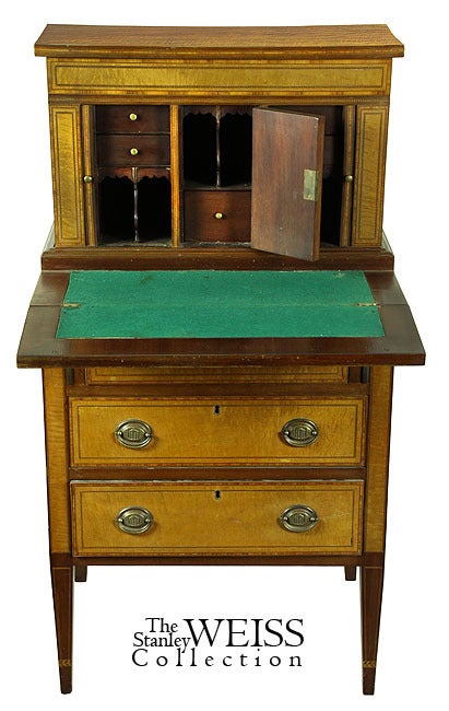 This small secretaire is composed of satinwood that makes a most eloquent statement and is inlaid with contrasting elements (please click for details to appreciate this aspect). While about 50-70 years old, the craftsmanship is all bench made and