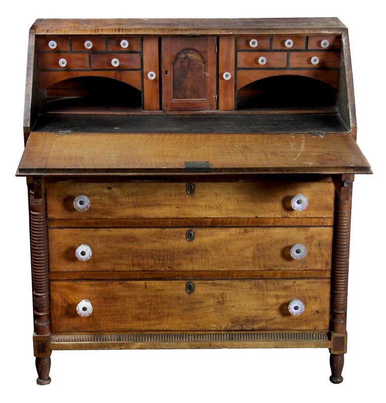 This is an absolutely untouched piece: Cobwebs and all. We were attracted to this piece not only because of its untouched, museum like quality, but also by the complexity of design.

The drawer fronts and lid are constructed of beautifully figured