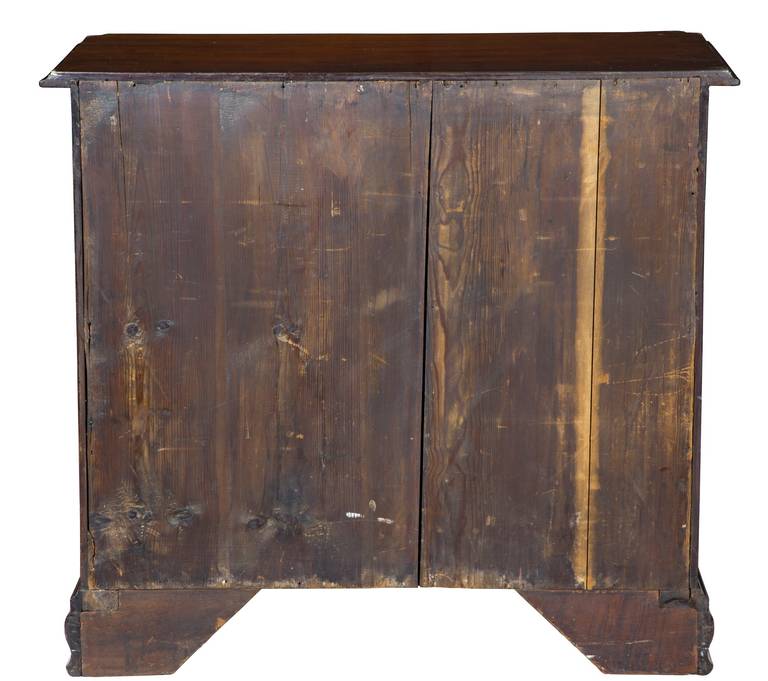 These bureaus come in varying quality and often, the front drawers are veneered as are other parts of the chest. However, this chest is all composed of very heavy solid Santo Domingo mahogany. The top has Classic crimped corners, and the quarter