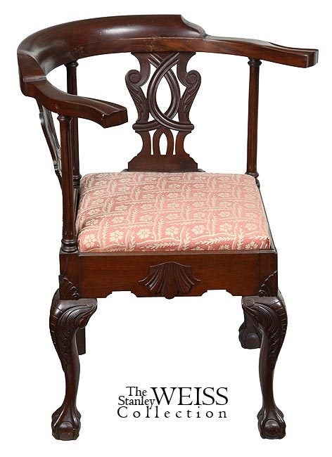 This interesting corner chair is beautifully crafted throughout with finely detailed splats, reeded posts, carved knees with shells, et al.  This piece is most interesting as it retains a copy of its original bill of sale from Sypher & Co. (see scan