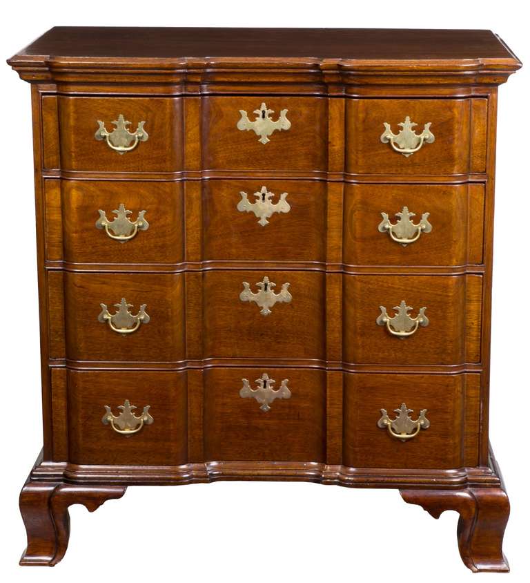 Mahogany chests coming out of Connecticut are most rare and a block front at that is as rare as it gets. It’s small scale, i.e. 34” width make it very attractive and it makes a bold statement. The brasses are replaced, and the feet restored. But we