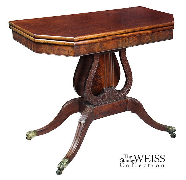 This is a truly exceptional card table in many ways. The lyre is quite a bit larger than ordinarily seen and is developed, with respect to carving, a tad more than other examples: see our detailed images for the carving between rosettes in the lyre.
