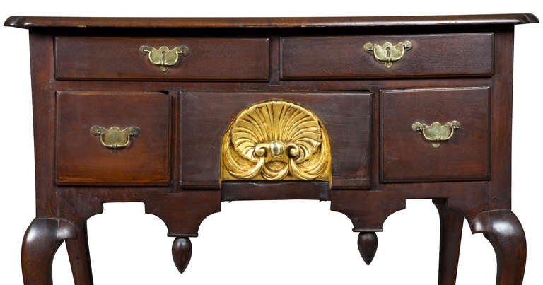 The rarest of all lowboys and perhaps most beautiful, are the Japanned lowboys and highboys that came out of Boston in the mid-18th century. Several of the major museums in the country have examples of this school and this piece was deaccessioned