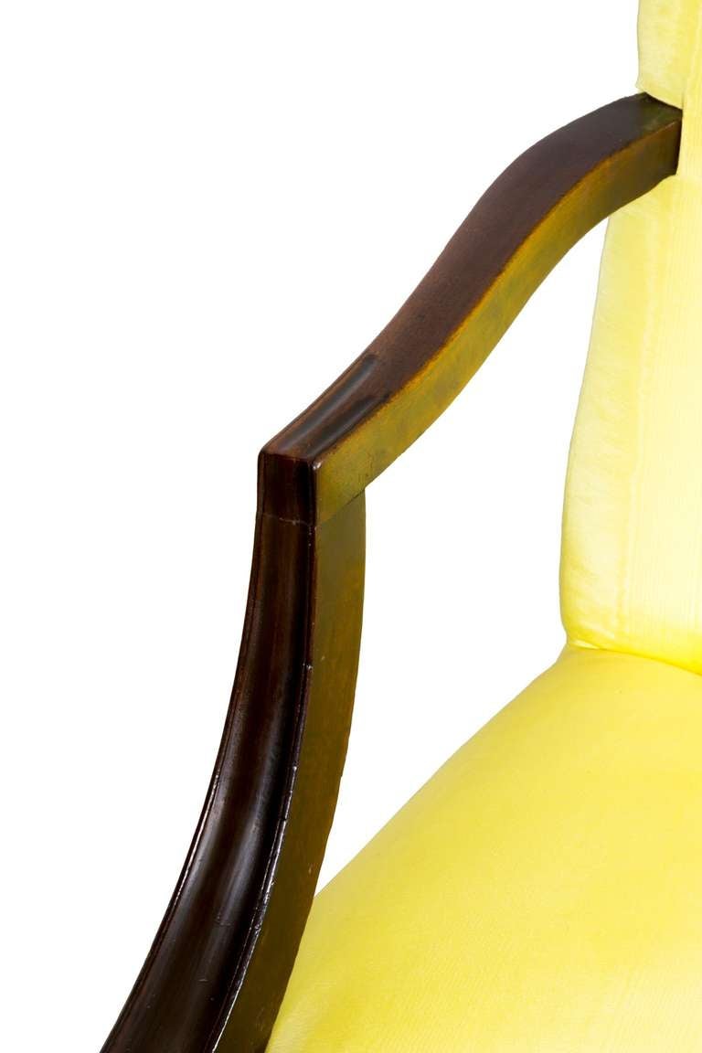 This chair is composed of a dark, dense cuban/island mahogany of the finest grade. It being an open armed armchair gives it a lightness and the rather tall back is a highly desirable feature.  Compare with the example that Sack shows.  Note that the