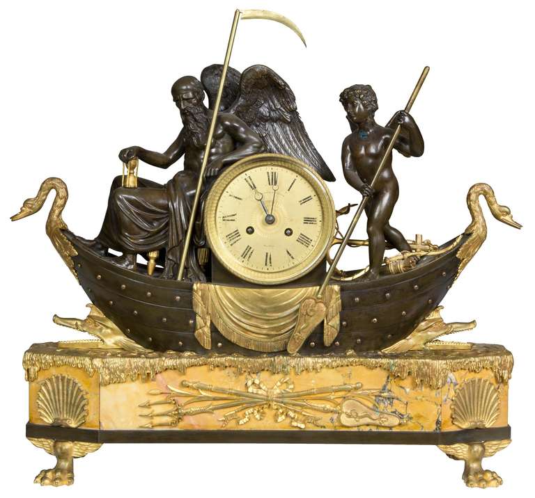 A large bronze and marble clock depicting father time, French, retailed by Camerden & Forster, New York, circa 1860.
 
 This is one of a small grouping of clocks with similar elaborate figural motifs. This one has perhaps more things going on than