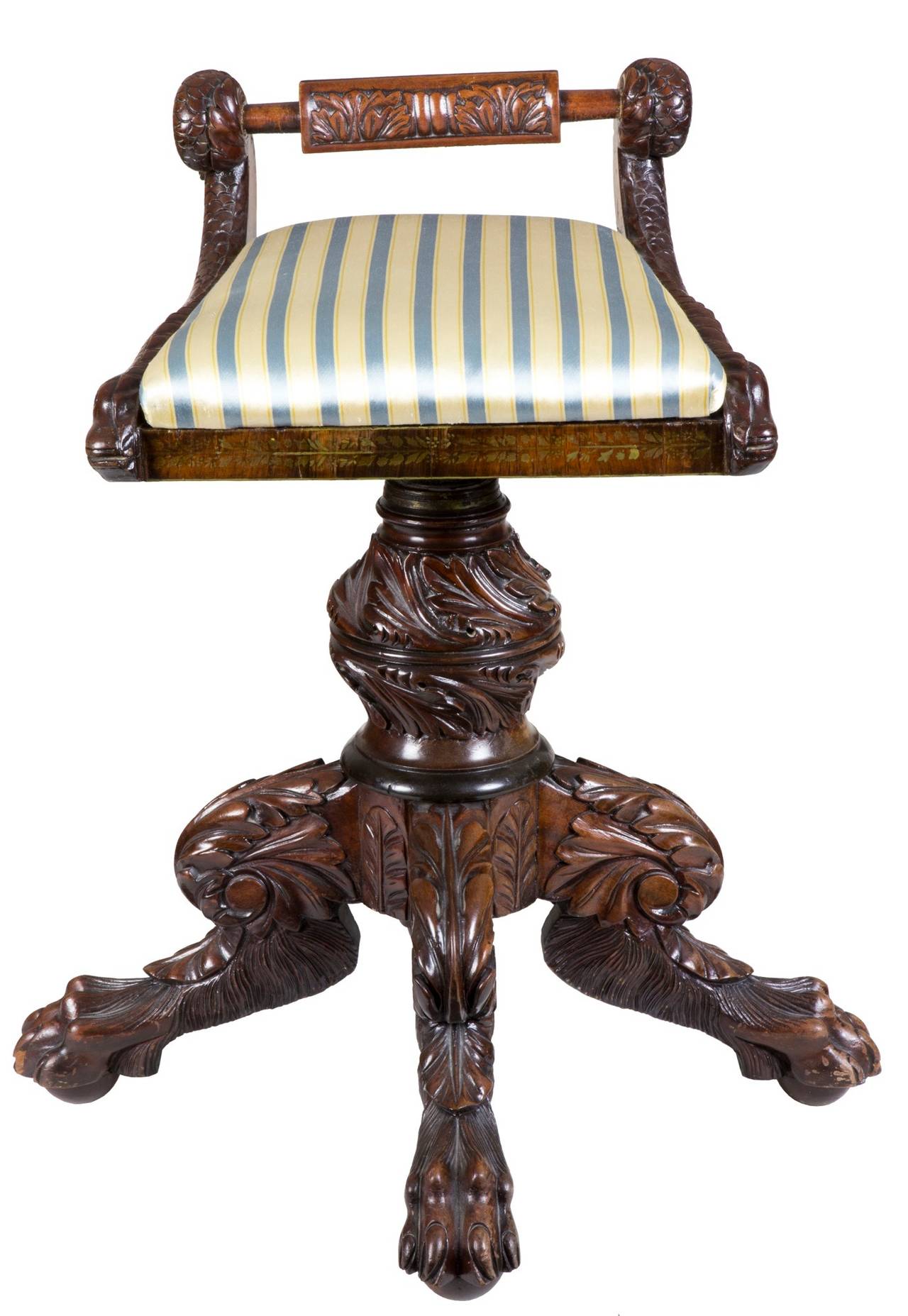 Piano stools took a lot of use and very few have survived intact as this one has. The carving throughout is the best. It’s deep and well-conceived, particularly the main column and acanthus carving in heroic depth. This stool remains in original