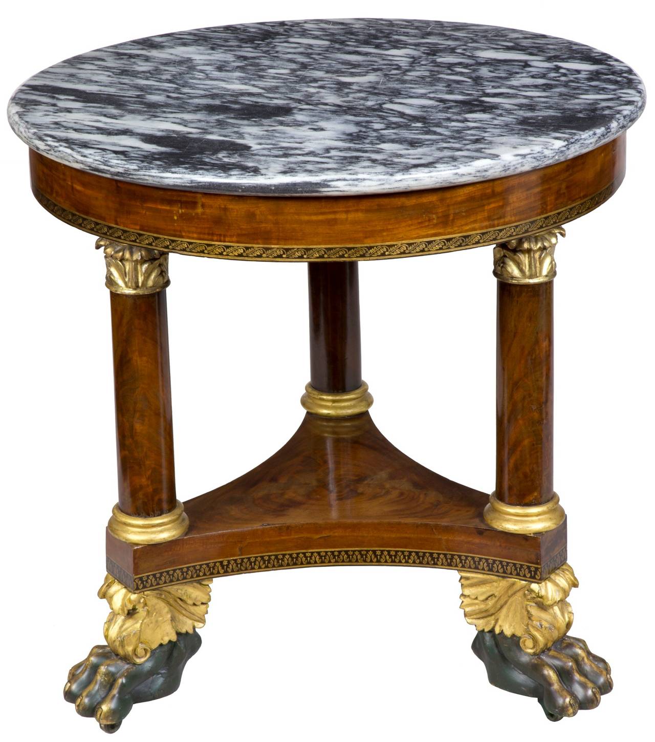 This marble table is on the small side, retaining its original King of Prussia marble. The stenciling is in superb condition, as is the beautifully figured marble. The paw feet are strongly developed and give this piece a commanding presence. It’s