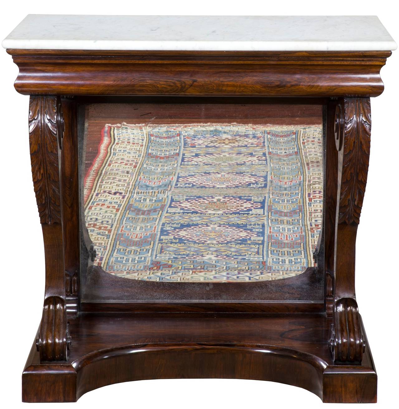 Pier tables in this period seldom appear in rosewood as this wood was just becoming fashionable. The rosewood is spectacular with color variation throughout. The carving of the acanthus, etc. is first class and the condition is superb, retaining its