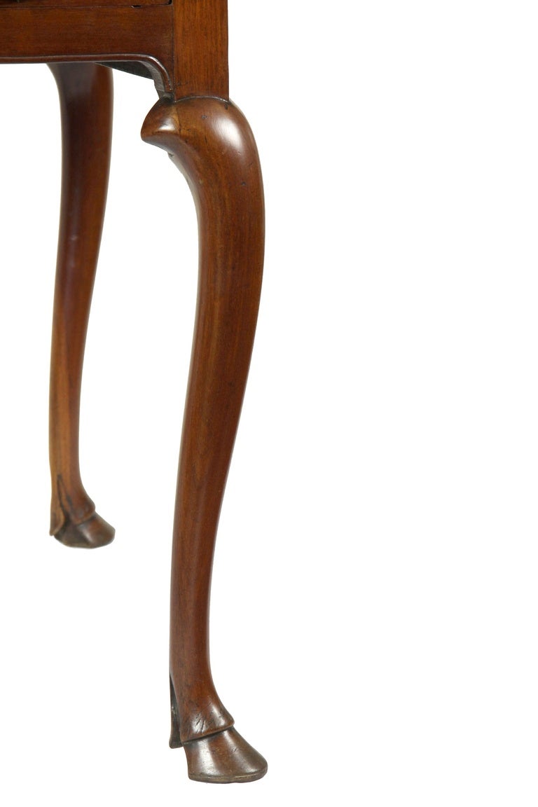 This is a rare example of early New York furniture with hoofed feet, which is beautifully executed throughout. It is indeed a treasure and is best described by this complete discussion of this piece by John Bivens, one of the luminaries in this