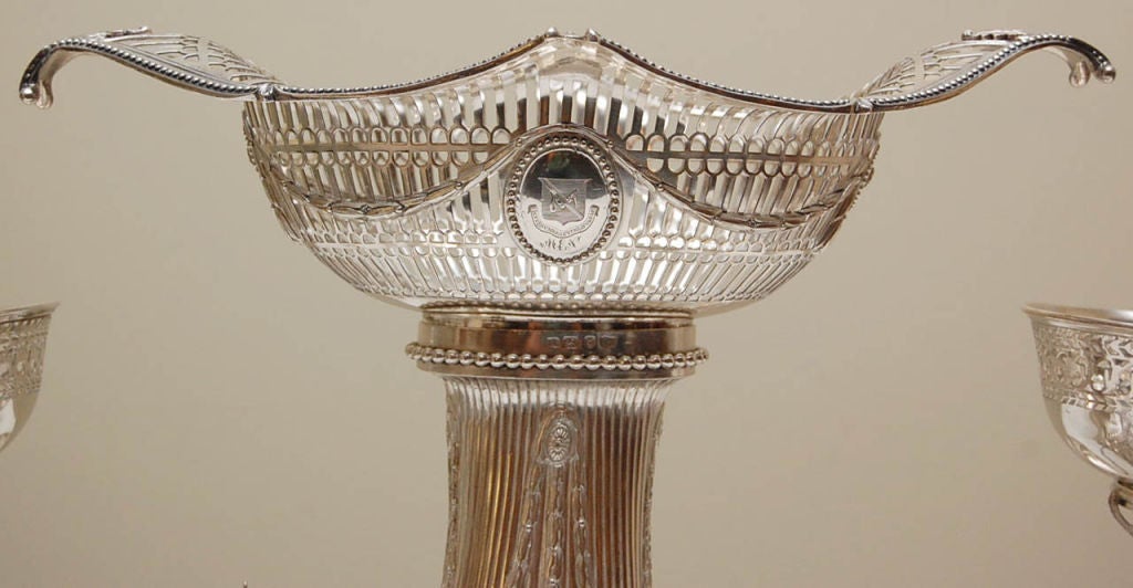 Georgian Sterling Silver Epergne Hallmarked London 1776 By The Most Renowned Silver Smith Thomas Pitts, Featuring A large Center Bowl With Six Dish Arms In The Neo Classical Style. This Piece Shows Exquisite Pierce Work, Casting And Applied