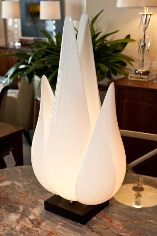 Pair of white translucient acrylic tulip shape lamps on black base