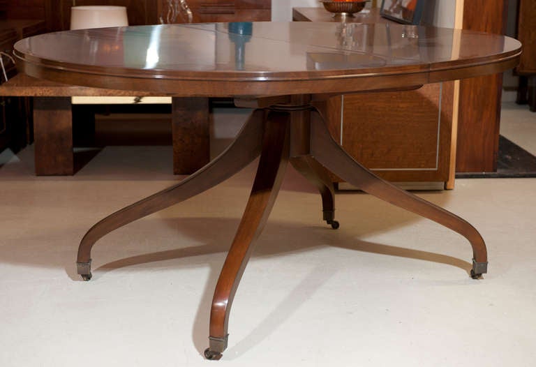 American Oval Single Pedestal Dining Table in the Style of Wormley For Sale