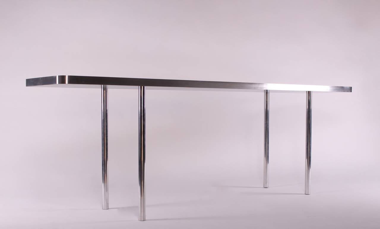 Jonathan Nesci,
Aluminum Console, limited edition, numbered 1 of 6.
United States, 2014,
Manufactured by Noblitt Fabricating,
1.5 inch solid water jet cut mirror polished aluminium.
Measures: 87 W x 18 D x 28.75 H inches.