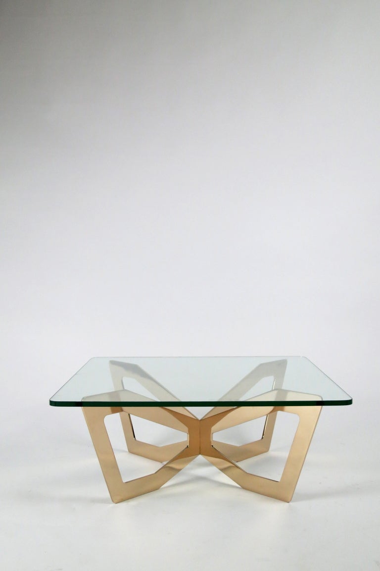 H1/3 Bronze coffee table with square glass top .
Mirror polished bronze
glass