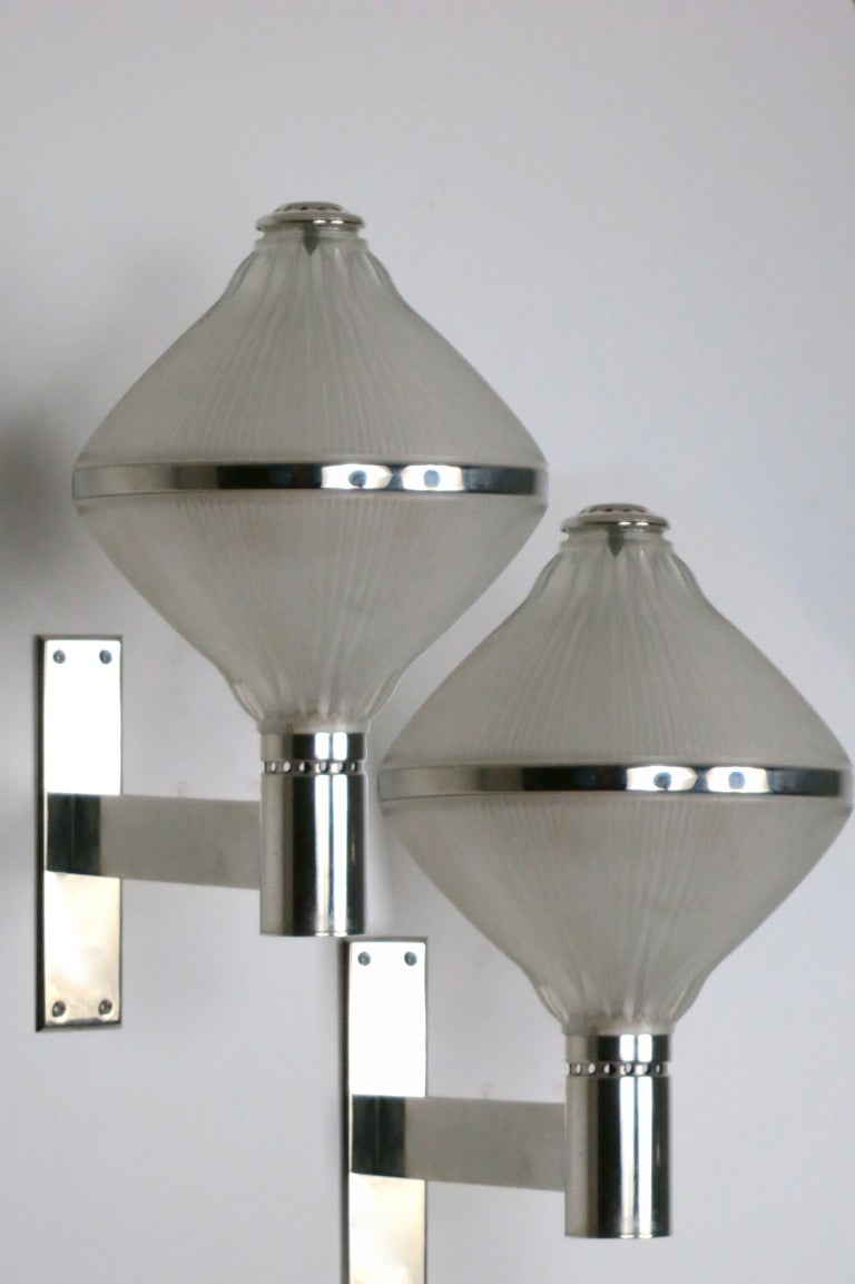 BBPR
Sconces
Italy, 1964
Manufactured by Artemide
chrome, glass
16 d x 19 h x 11 w inches