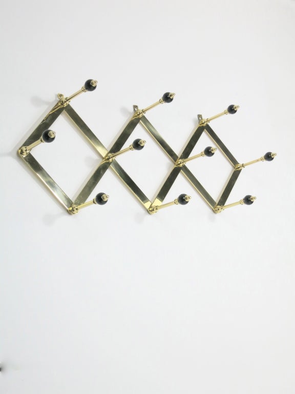Caccia Dominioni
Coat rack
Italy, 1950
Manufactured by Azucena
brass, plastic
19 to 39 w inches