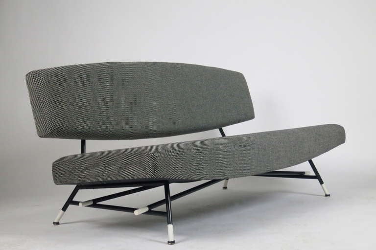 ICO PARISI
Rare LOVESEAT , model no. 865, circa 1955

Fabric, painted tubular metal.

29 1/2 x 63 1/2 x 27 1/2 in 

Manufactured by Cassina, Italy