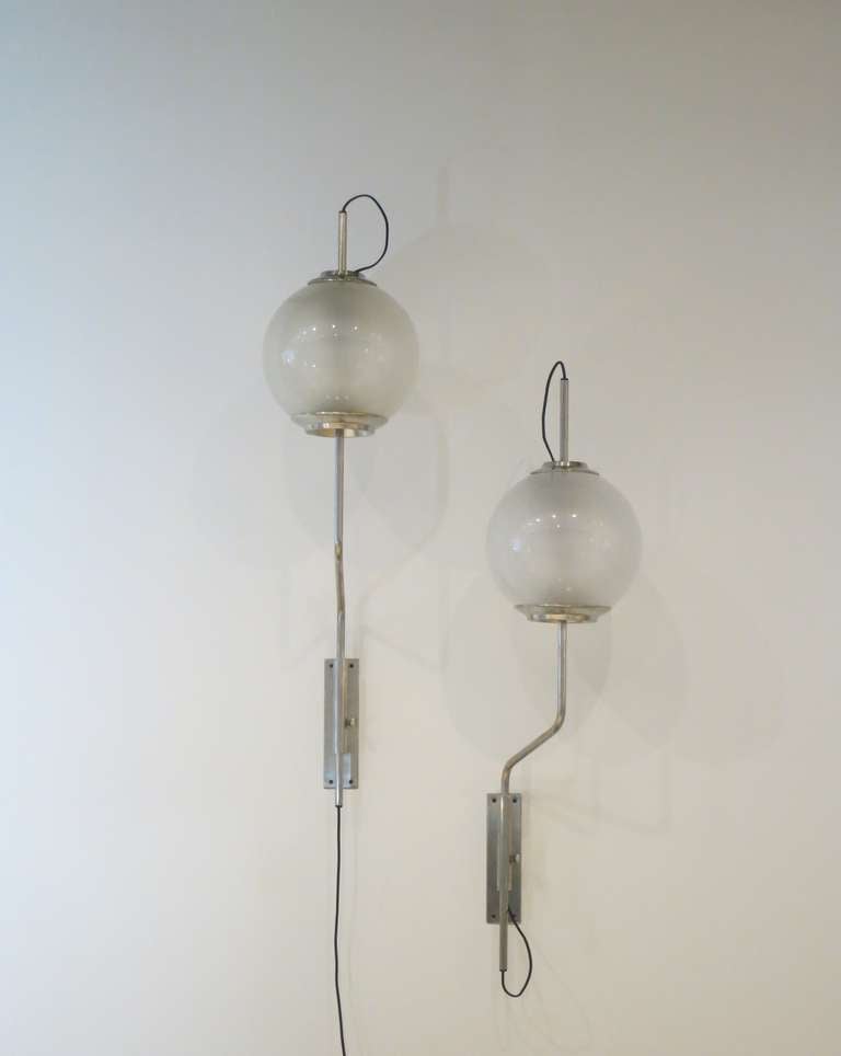 Luigi Caccia Dominioni
Pallone sconces model Lp 11, pair
Italy, 1958
Manufactured by Azucena
nickel plated brass, glass
11.5 w x 16.25 d x 45 h inches
http://it.wikipedia.org/wiki/Luigi_Caccia_Dominioni