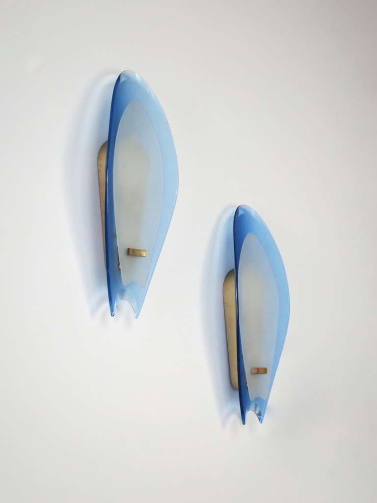 Max Ingrand
sconces, pair
Italy, circa 1958
Manufactured by Fontana Arte
crystal, brass
7.25 w x 3 d x 18.75 h inches