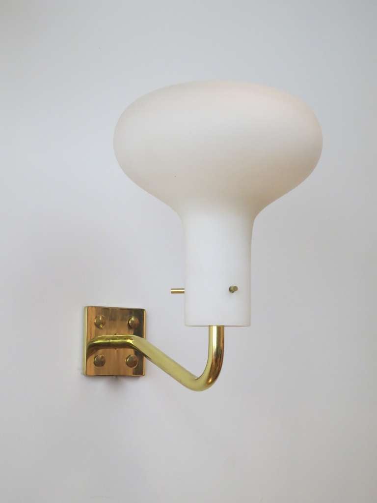 Ignazio Gardella.
LP 12A wall sconces,
Italy, 1960.
Manufactured by Azucena.
Available in brass, or nickel-plated brass, frosted glass.
Dimension: 8 W x 14 H x 10 D inches.