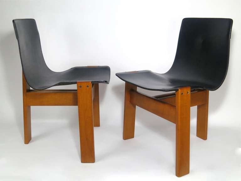 Angelo Mangiarotti
Tre 3 Chairs set
Italy, 1978
Manufactured by Skipper
wood, metal, leather
30.25 h  x 20 w x 21 d inches
http://en.wikipedia.org/wiki/Angelo_Mangiarotti
