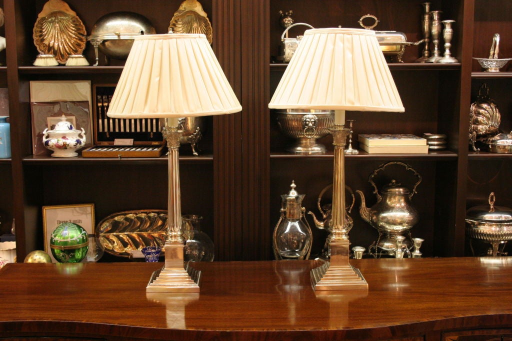 Pair of silver lamps