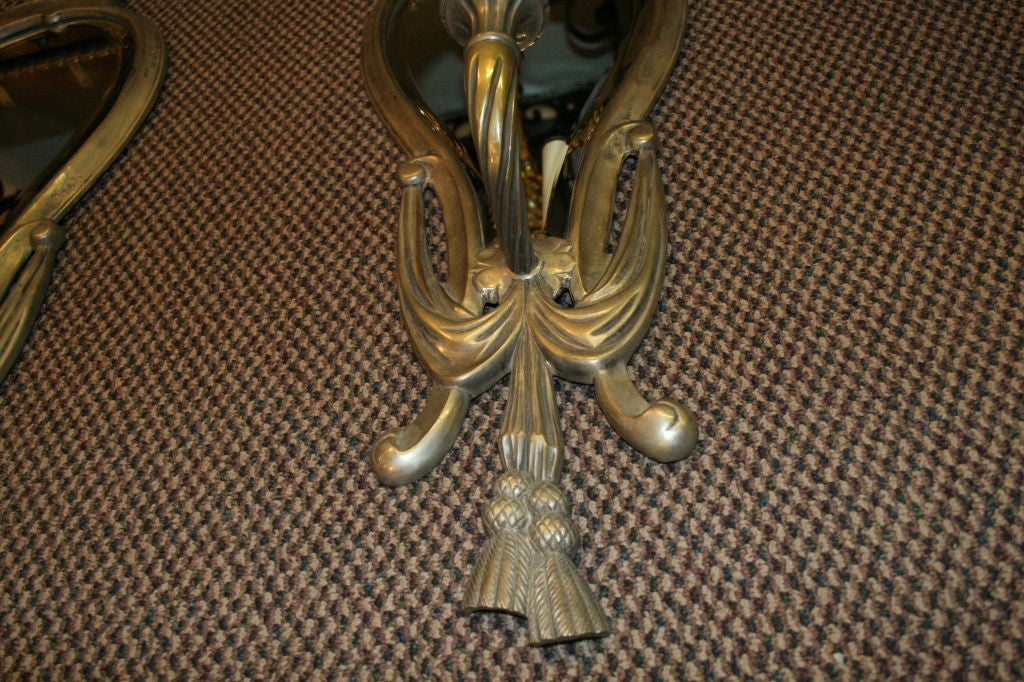 Mirror backed sconces