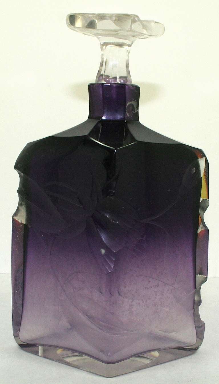 There are a lot of perfume bottle collectors out there and this one is a beauty. Great color and probably Moser glass.