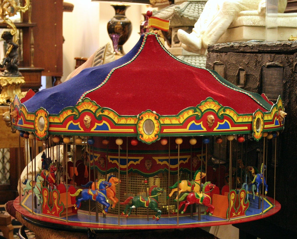 We are so excited to offer a special item for your holiday consideration. This is just a wonderful piece that makes us all think of those happy days on the carousel. A great wonderful size, with beautiful all moving parts, plus a great selection of
