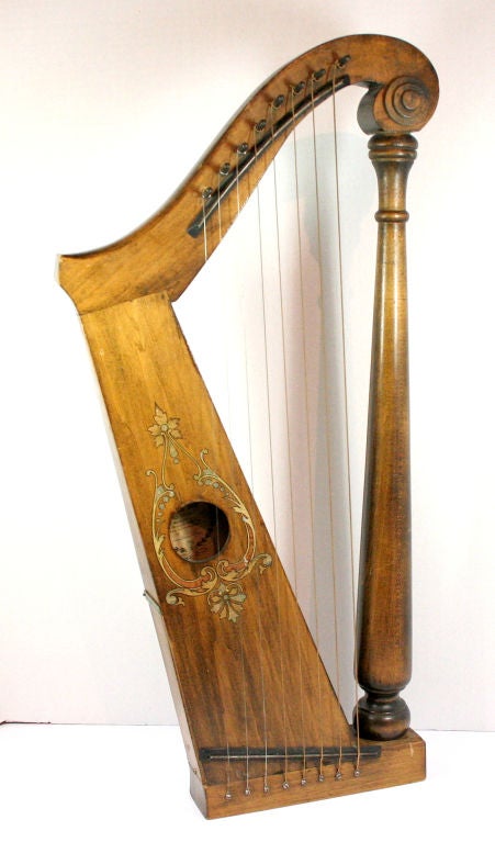 Superb harp, music box made by Ward Stetson with original label intact. This magnificent piece is a wonderful conversation item for the study or wherever. The look on your guests faces when the music box plays will be one of complete fascination.