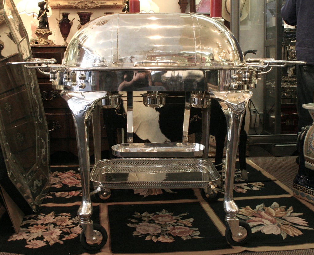 What a piece for the house that almost has everything. This is a magnificent all silver plated roast beef trolley that has all the trimmings for that special meal. Make sure you invite us for the feast. This is a must for the most disriminating