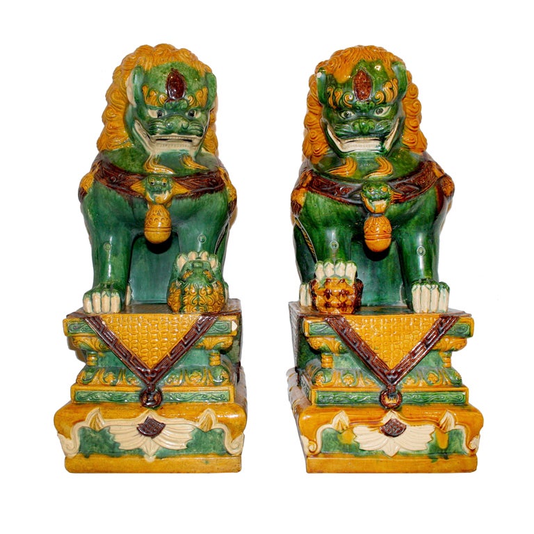 Pair of Ceramic Foo Dogs For Sale