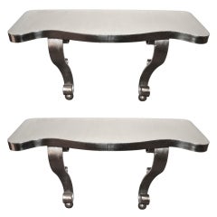 Pair of Wall-Mounted Polished Metal Consoles