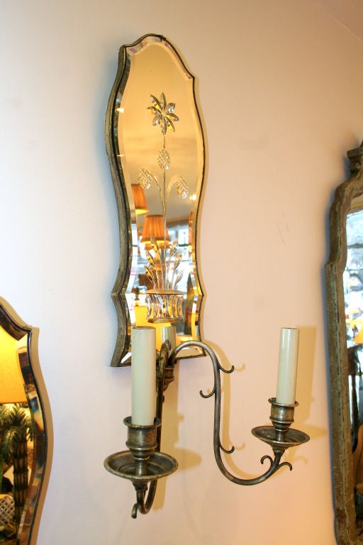 Set of four mirror back sconces