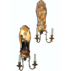 Set of four mirror back sconces Set of four mirror back sconces