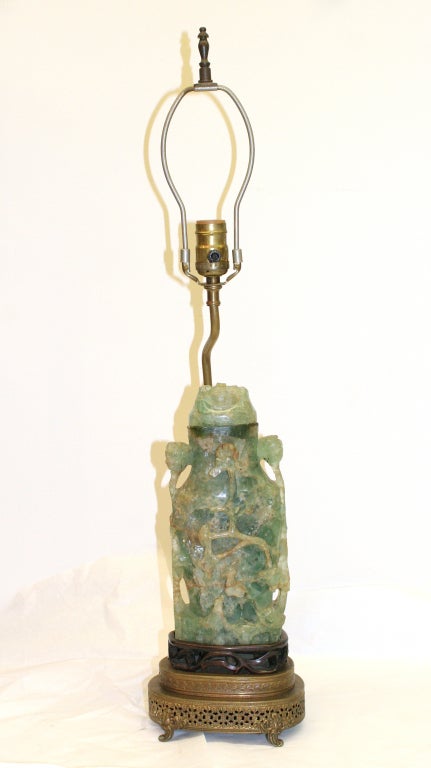 Wonderful jade quartz lidded jar mounted as a lamp. This one also has a nite light that throws off a wonderful diffused illumination. We always sell these and find great demand for them