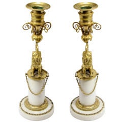 Pair of Gilded Bronze Lions on Marble Column Base Candlesticks Pair of Gilded Bronze Lions on Marble Column Base Candlesticks