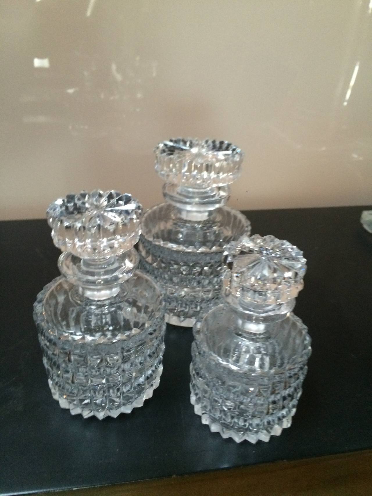 Beautiful and petite decanters perfect for perfumes, waters, special potions.
 
Measures: Smallest is 4