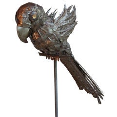 Brass Parrot on stand after Sergio Bustamante