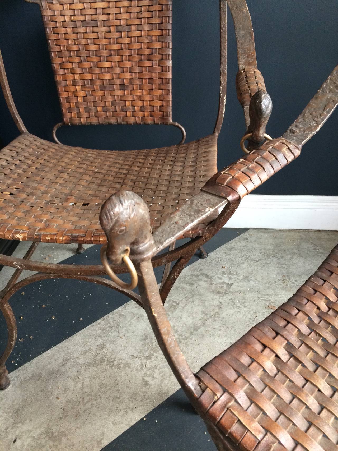 Wrought Iron Armchairs with Distressed Leather Caning In Distressed Condition In Los Angeles, CA