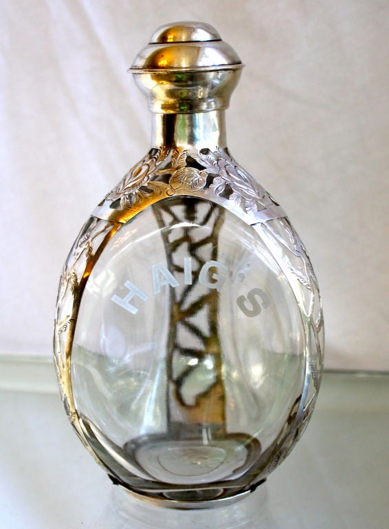 Haig's glass container with Sterling silver overlay - 