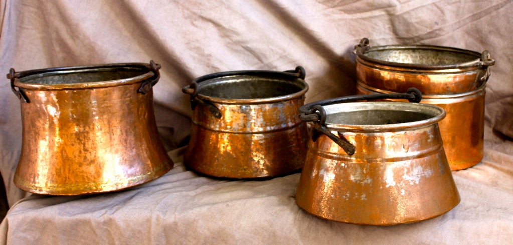 Selection of four copper pots - beautifully made, and wonderful companion to the kitchen decor or used as a planter.  Sold individually for 450.00 each