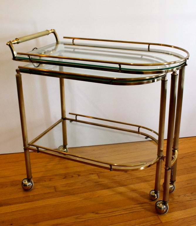 This expandable brasss Three level bar cart is the perfect companion to any room - can be used as a side table, smaller cart can tuck away OR expand the bar and have a PARTY!  - could also be used as a console piece along a wall or divide a room...