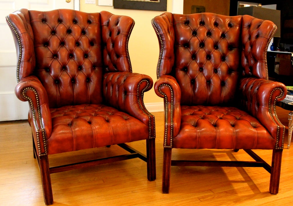 Stunning pair of leather Chesterfield wingback chairs - the pair are not only impressive and large, but are comfortable... whether you are in a waiting area, board room or sipping your mint julep in the den - relax in sophisticated style