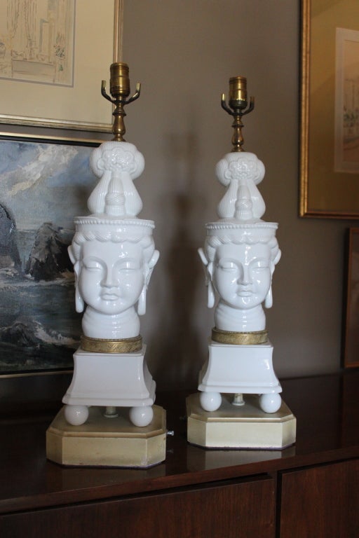 Impressive pair of white glass Quan Yin figurative head table lamps with gold banding detail on wood bases