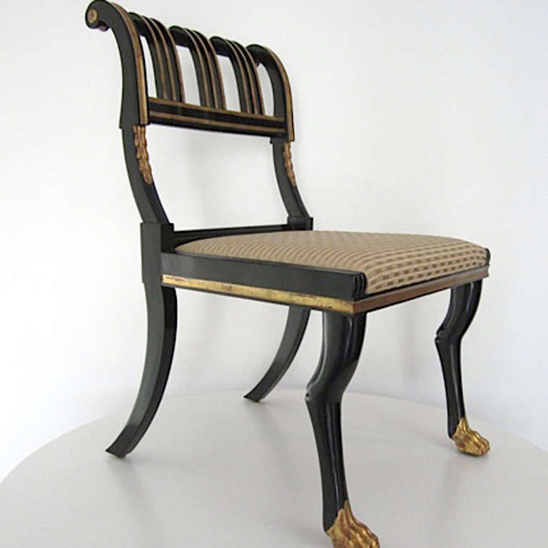 Rose Tarlow ebony and gilt claw foot chair