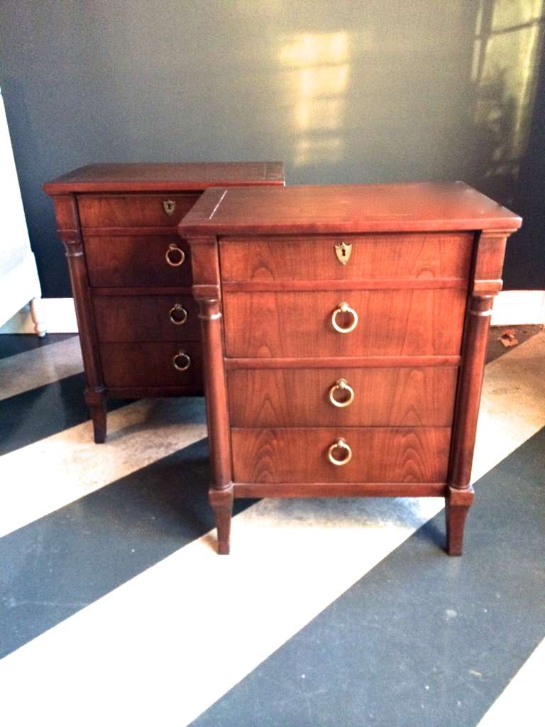 Beautiful and rather small, these nightstands have a fold down top 'drawer' for easy storage of books, etc. circa 1950, fruitwood.