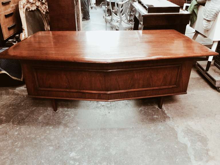 The Monteverde-Young Executive Desk, while stunning and beautifully designed is in fair condition,we are offering the piece as is and can be refinished to the client's specifications for the price offered.  This flexibility gives the client the