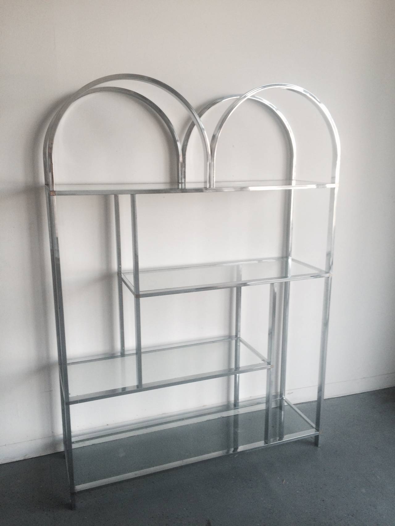 Lovely six shelf etageres with brass details.